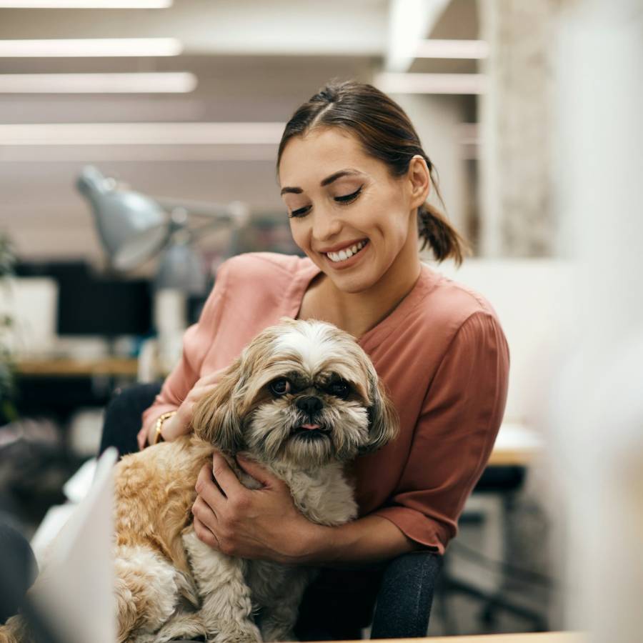 women holding the pet